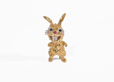 A gold diamond and gem-set brooch, by Kutchinsky - Sold for €1,200