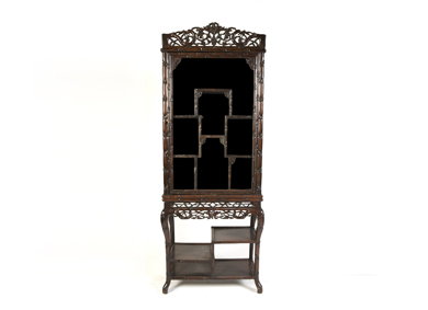 An oriental cherrywood display cabinet, c.1900 - Sold for €4,000