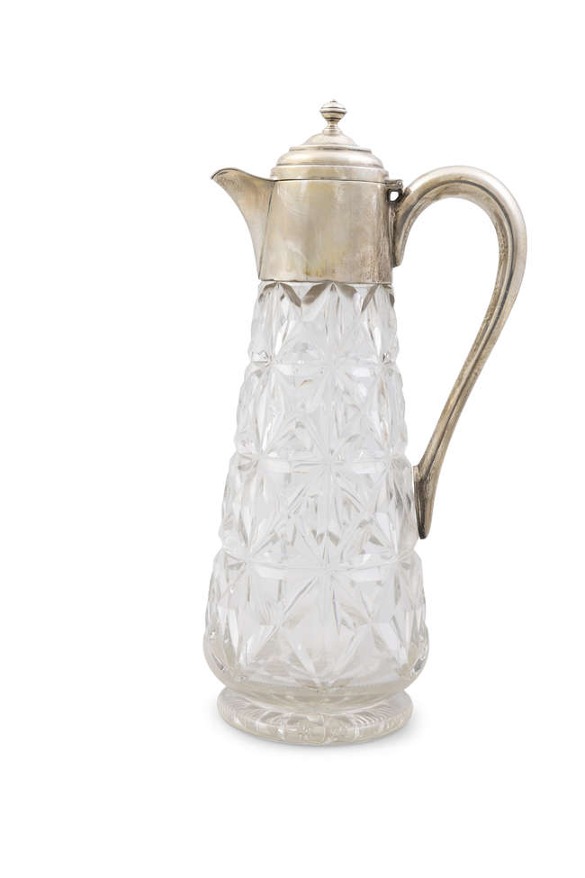 A SILVER AND CUT GLASS CLARET JUG

Sheffield, c...., Fine Irish Art at Adams Auctioneers